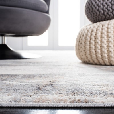 Ivory and Gold Geometric Flat Woven Synthetic Area Rug