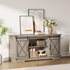 TV console suitable for 65-inch televisions, featuring sliding barn doors. Living room storage combination unit and TV console. - 3 of 4