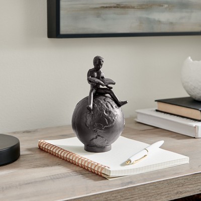 Bronze Cast Iron Boy Reading on Globe Tabletop Sculpture