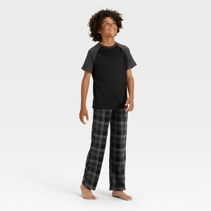 Boys' Short Sleeve T-Shirt and Plaid Fleece Pants Pajama Set - Cat & Jack™ - 1 of 4