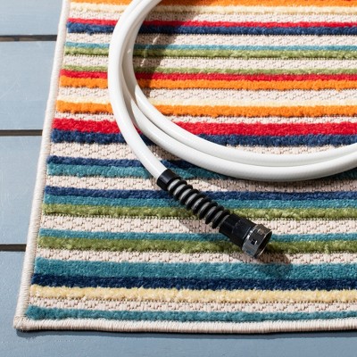 Ivory and Green Striped Synthetic Indoor/Outdoor Area Rug