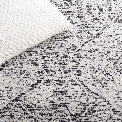 Black and Ivory Geometric Wool 3' x 5' Area Rug