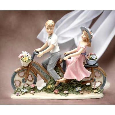 Charming Ceramic Couple on Bicycle Figurine with Floral Details