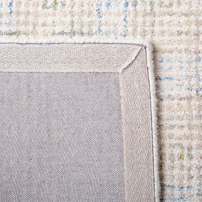 Ivory Abstract Tufted Wool Round Area Rug 95"