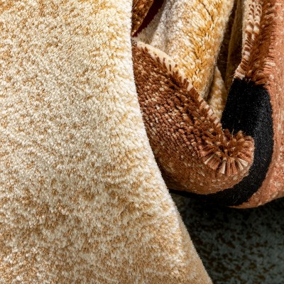 Ivory and Beige Geometric Synthetic 8' x 10' Area Rug