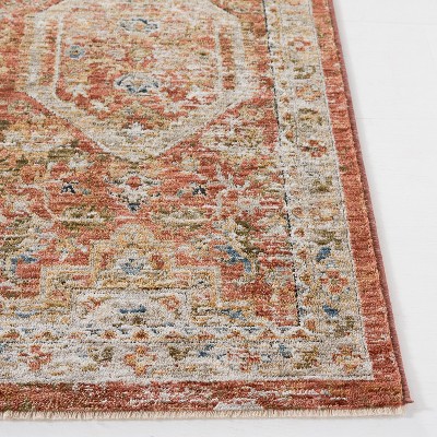 Rust and Blue Hand-Knotted Synthetic Area Rug