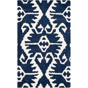 Wyndham WYD323 Hand Tufted Indoor Rugs - Safavieh - 1 of 4