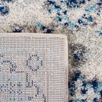 Ivory and Blue Hand-Knotted Round Synthetic Area Rug