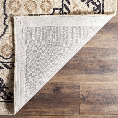 Ivory and Charcoal Tufted Wool Rectangular Area Rug