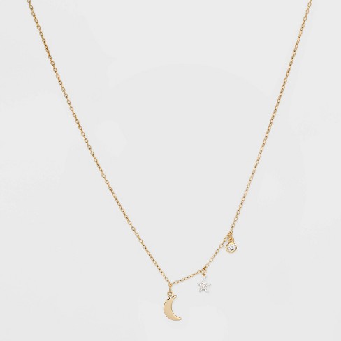 Gold necklace with moon deals and star