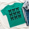 The Juniper Shop Coquette Black Bows Collage Distressed Toddler Short Sleeve Tee - 3 of 4