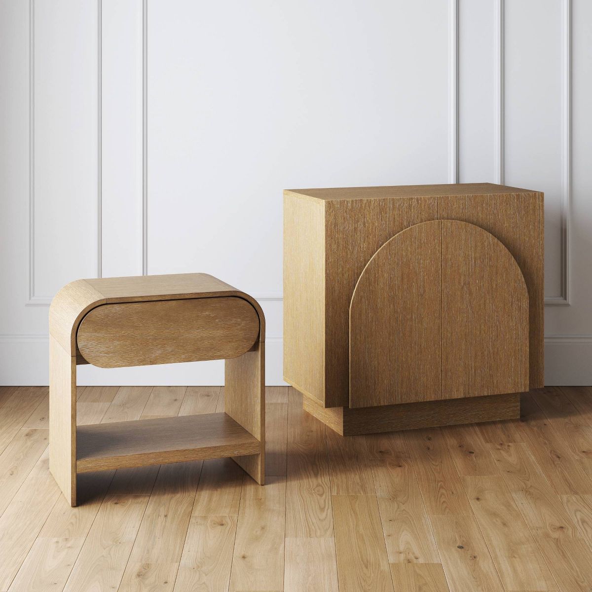 Two matching nightstands with rounded drawer-front in light brown