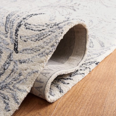 Ivory and Grey Floral Tufted Wool Area Rug 8' x 10'