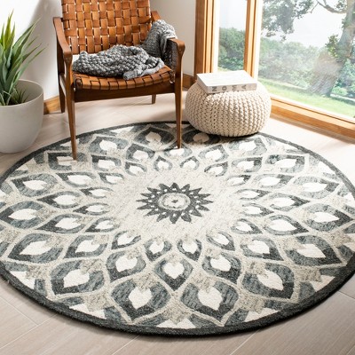 Handmade Charcoal and Ivory Wool 6' Round Tufted Area Rug