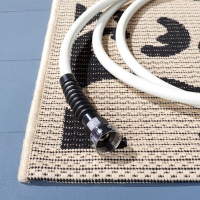 Black and Sand Synthetic Stain-Resistant Indoor/Outdoor Rug