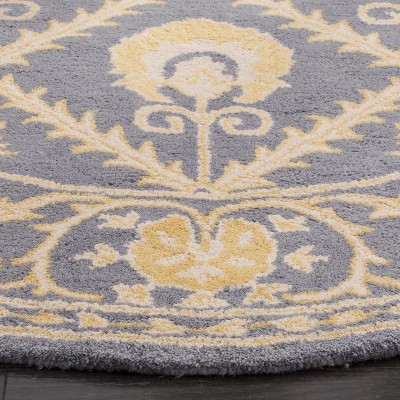 Handmade Blue and Gold Round Wool Tufted Area Rug