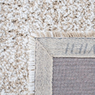 Ivory 8' x 10' Handmade Tufted Shag Rug