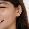 Girls' XOXO CZ Huggie Hoop Sterling Silver Earrings - In Season Jewelry - 3 of 4