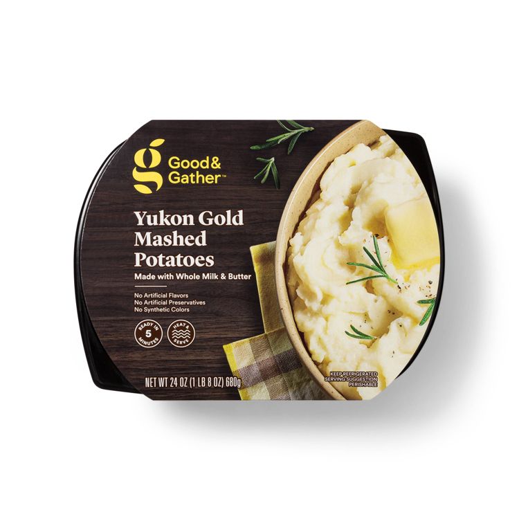 A package of Good & Gather Yukon Gold Mashed Potatoes, made with whole milk and butter, weighing 24 oz (1 lb 8 oz) or 680g.