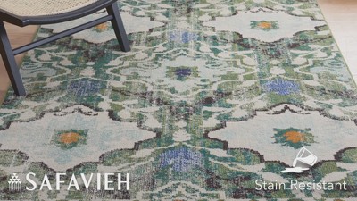Ivory and Green Geometric Synthetic 8' x 10' Area Rug