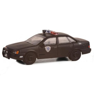 Greenlight Collectibles 1/64 1986 Ford Taurus LX, Weathered Robocop, Anniversary Collection Series 15, 28120-D - 1 of 2