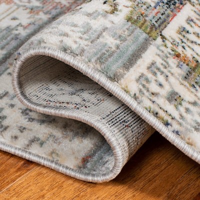Elegant Ivory Oriental 4' x 6' Synthetic Area Rug