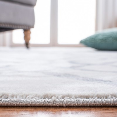 Ivory and Grey 4' x 6' Hand-Knotted Synthetic Area Rug