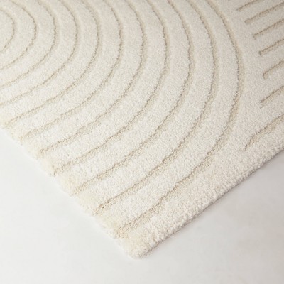 Cream Synthetic 5' x 7' Reversible Rectangular Rug