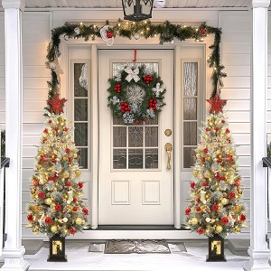 4.5ft Pre-Lit Snow Flocked Artificial Christmas Tree with 200 Lights & 12 Red Berries-286 Branch Tips,Snowman Potted Base for Home/Office - 1 of 4