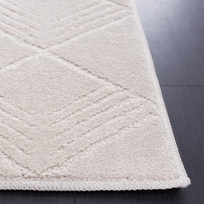 Ivory Geometric Pattern Power Loomed Area Rug 5'3" x 7'6"