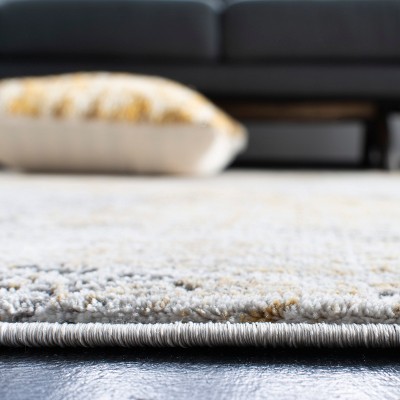 Grey and Beige Abstract Synthetic Area Rug 4' x 6'