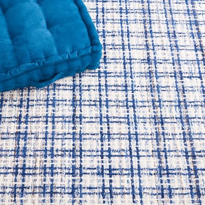 Handmade Blue and Ivory Wool Tufted Rectangular Area Rug, 4' x 6'