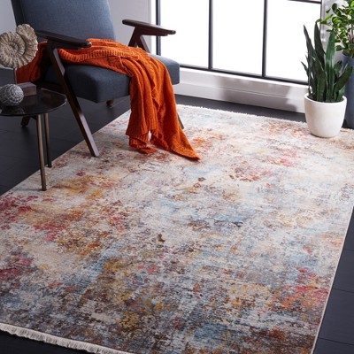 Vintage Persian Rust and Blue Synthetic 5' x 7' Area Rug
