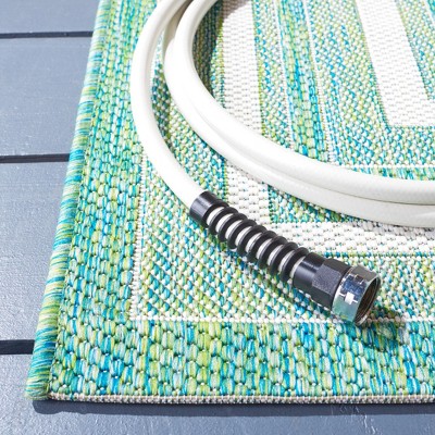 Ivory and Green Reversible Synthetic Indoor/Outdoor Area Rug