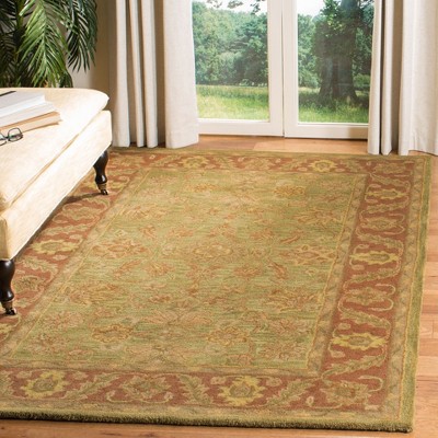 Elegant Jaipur Green/Rust Hand-Tufted Wool Rug - 59" x 84"