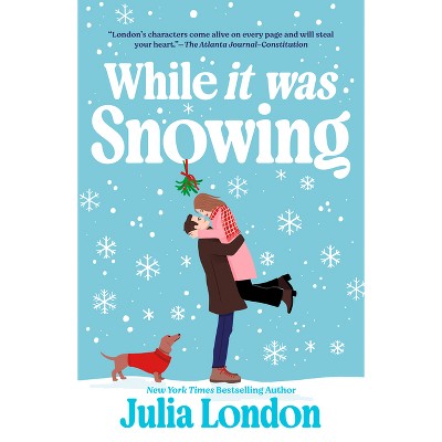 While It Was Snowing - by  Julia London (Paperback)
