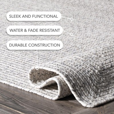 Handmade Ivory Braided 4' x 6' Oval Synthetic Area Rug