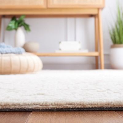 Ivory Hand-Tufted Wool and Synthetic 4' x 6' Area Rug