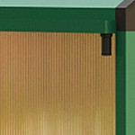 green sun room with sliding door