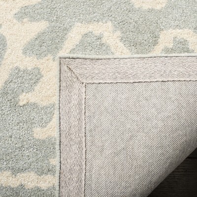 Grey and Ivory Hand-Tufted Wool 6' x 9' Area Rug