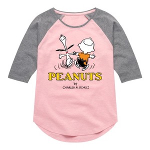 Girls' - Peanuts - Charlie Snoopy Dancing Shirt Tail Raglan Graphic T-shirt - 1 of 3