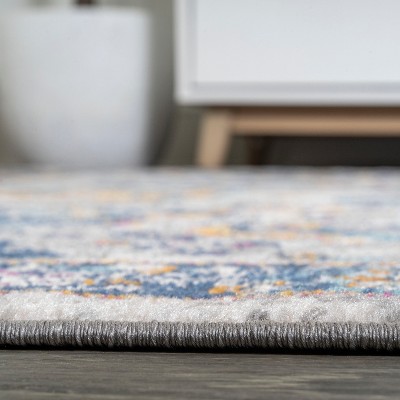 Izil Light Gray and Blue 9' x 12' Synthetic Persian Area Rug
