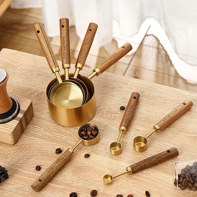 SUGIFT 8 Piece Gold Measuring Cups and Spoons Set Stainless Steel Measuring Cups with Wooden Handles Engraved Measurements