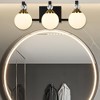 PAKOKULA 3-Light Black and Gold Vanity Light with Globe White Frosted Glass Shade - 4 of 4