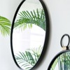 FONTOI 24" Round Wall Mirror with Contemporary Minimalist Frame for Living Room Foyer Entryway and Bedroom Enhancing Modern Wall Decor, Black - 4 of 4