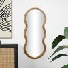 47"x20" Wooden Wavy Shaped Wall Mirror with Ribbed Frame Gold - Olivia & May - 2 of 4