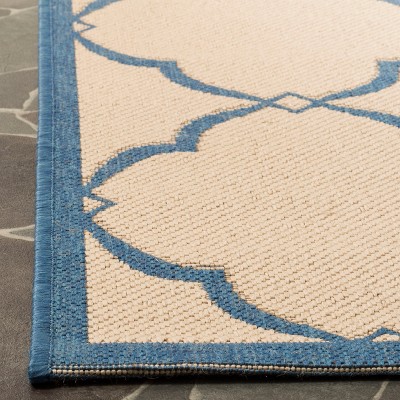 Cream and Blue Geometric Flat Woven Area Rug