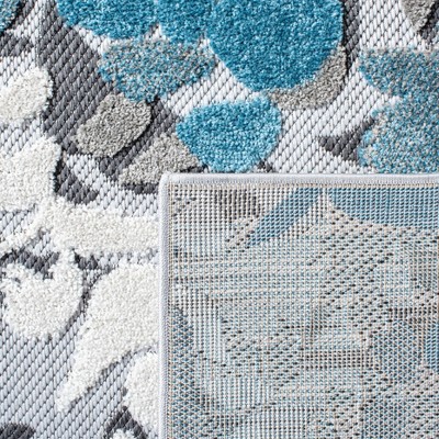 Beige and Blue Floral Synthetic Indoor/Outdoor Rug