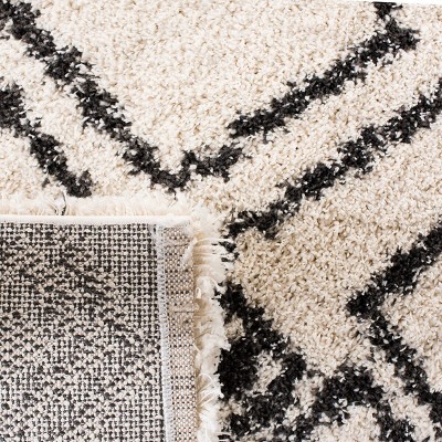 Ivory and Charcoal Geometric Shag 5' x 7' Area Rug