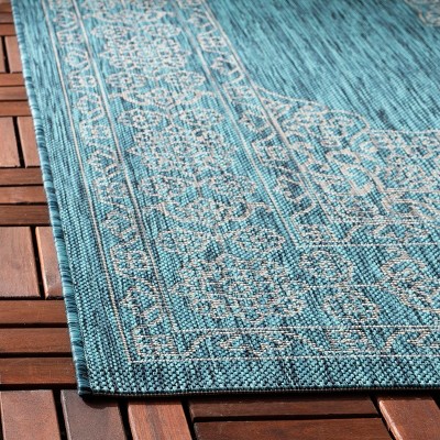 Teal and Ivory Rectangular Synthetic Indoor/Outdoor Rug